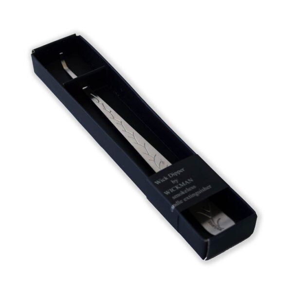 A silver tweezers in a black box.