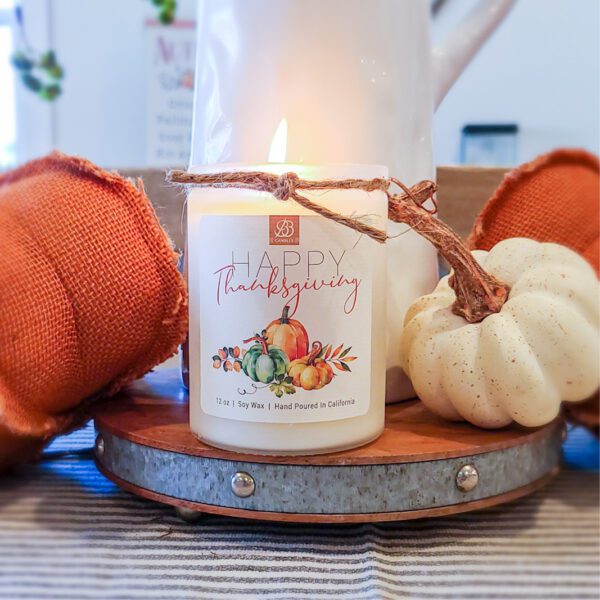 12oz Happy Thanksgiving candle on a wooden tray.