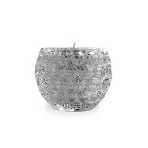 A silver candle holder with a pattern on it.