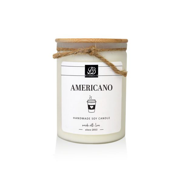 A white candle with a label.