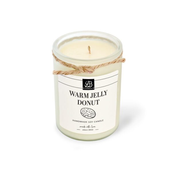 A white candle with a label that reads warbubly donut.