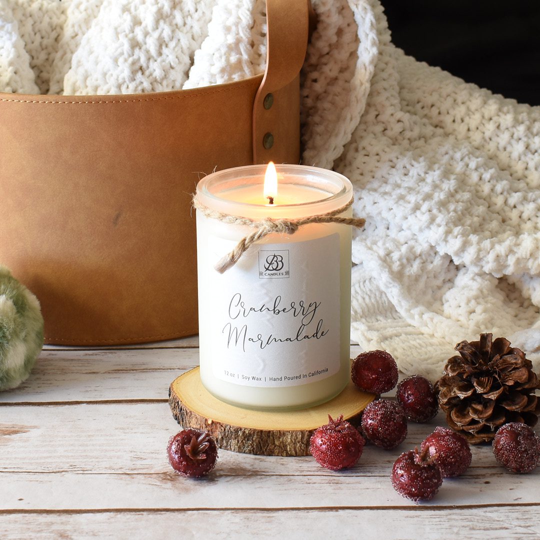 Scented cranberry magnolia soy candle perfect for home decor.